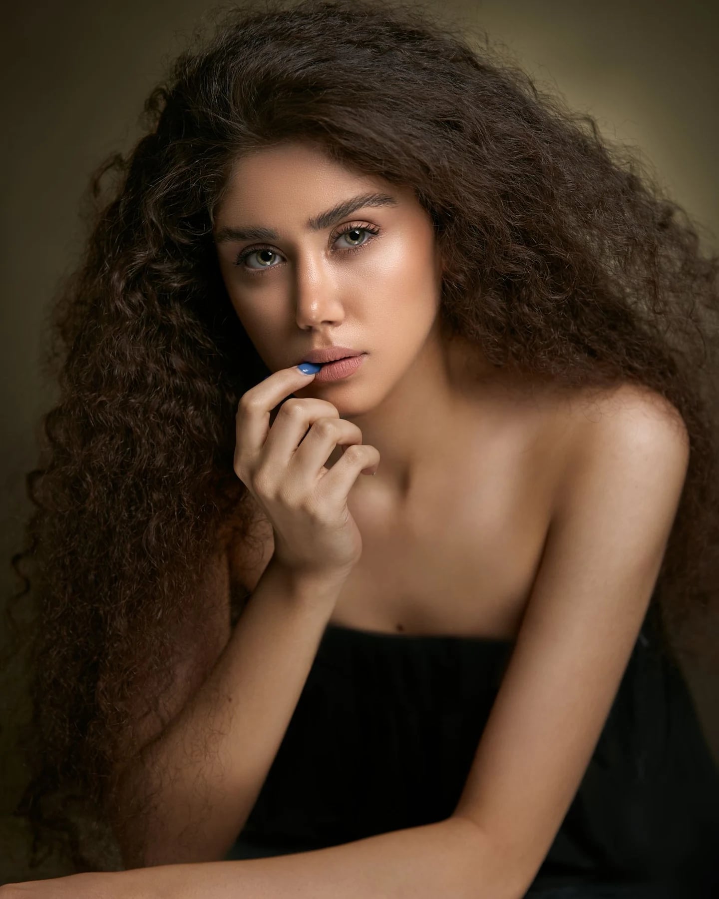 Portrait with voluminous curly hair