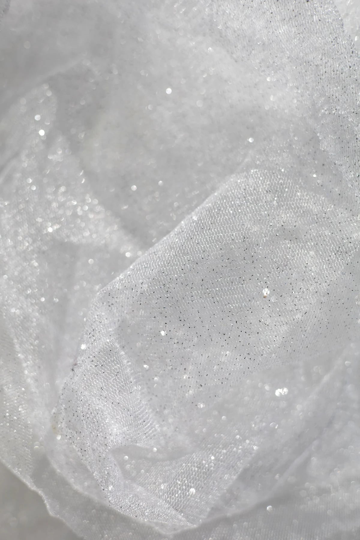 Close-up of sparkling fine mesh fabric